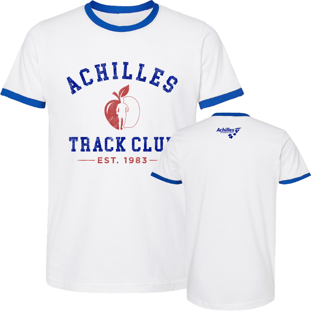 White ringer t-shirt with blue collar and sleeve trim, featuring a red and blue graphic on the front that reads 'ACHILLES TRACK CLUB EST. 1983' with an apple and persons silhouette, and a small Achilles International logo on the back neck.