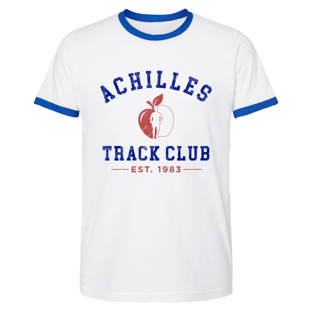A white ringer t-shirt with blue trim on the collar and sleeve cuffs, featuring a red and blue graphic on the front that reads 'ACHILLES TRACK CLUB EST. 1983' with an apple logo with a persons silhouette.